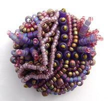beaded button by Robin Atkins, bead artist