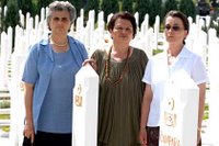 Srebrenica Massacre widows Zumra Sehomerovic, Kada Hotic and Sabaheta Fejzic (from left to right) in Bare cemetery, Sarajevo.