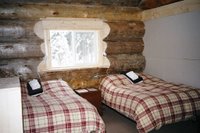 Guest bedroon in Chatter Creek's Solitude Lodge