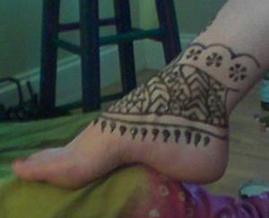 bold henna anklet tattoo