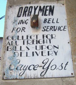 Old painted sign at delivery door, Hopkinsville, KY