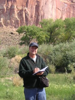 Roland Lee sketching on location in Capitol Reef National Park in preparation for a watercolor painting of Capitol Reef