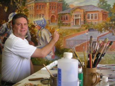 Roland Lee at work on an oil painting