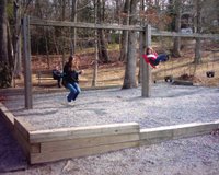 Emily & Lauren on the swings at Lake Tomahawk