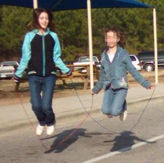 Emily and friend skipping