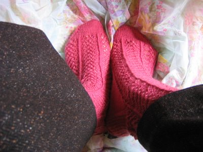 pink hedera socks on flower fabric