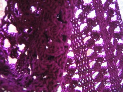 close up of red crochet scarf