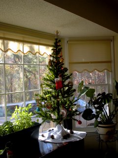 This is the smaller faux tree from Japan that is sitting in our bay window on the buffet in our dining room.
