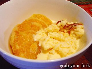 baked oranges with Cointreau and caramel swirled vanilla ice cream
