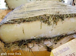 cheese covered with hay