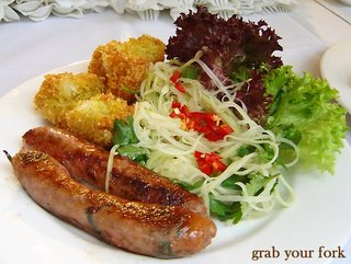 thai style pork sausages on a plate