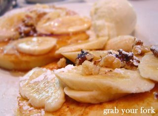 Pancakes with banana, walnuts and ice cream