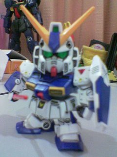 Gundam NT-1 in normal mode, with beam saber and shield