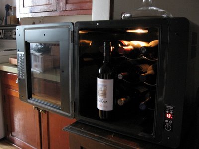 Chambrer wine cellar appliance refrigerator inside view stocked