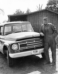John Wayne poses with International Truck
