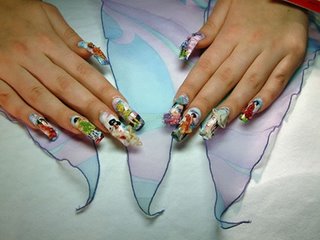 painting on fingernails. japanese theme. you can see japanese ancient art on it. using airbrush