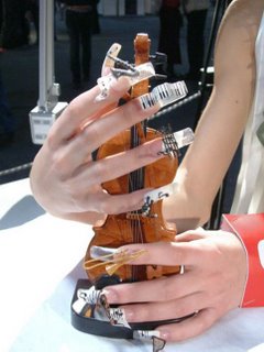 creative nail arts. can you see the musical instrument on fingernails?