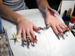 creative fingernails art. this girl uses ocean theme. item included on nails are starfish, seahorse, shell etc