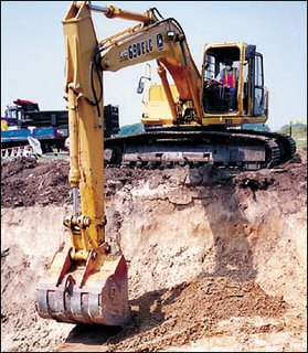 When you're in a hole... hire a JCB