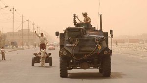 A Saxon APC on patrol in Basra