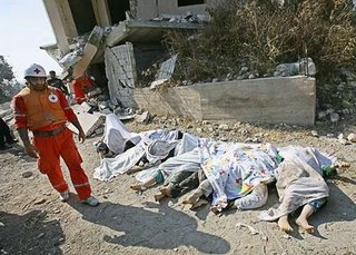 The aftermath of the Israeli air strike at Qana