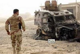 An Iraqi Army armoured Land Rover, destroyed by an IED