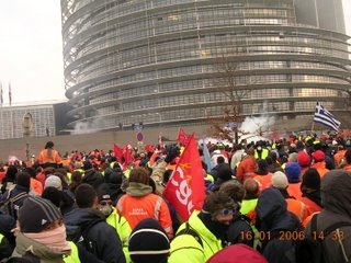 Protestors assemble outside the parliament in Strasbourg