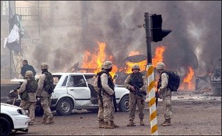 A bomb explosion at the entrance to the green zone in January 2004