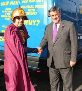 UKIP leader, Roger Knapman (right), discussing enlargement with one of his members