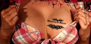 Advertising for Success Tattoo on boob