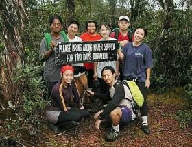  The group of Malaysian Nature Society Members took a breather<br />while on their way to the summit of Gunung Benom.</