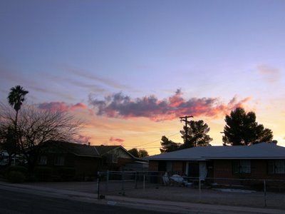 sunset over  a neighbor's house