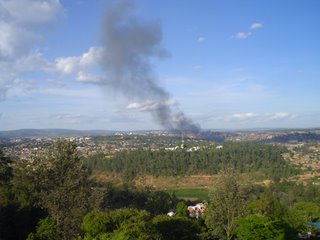 Kigali skyline with smoke