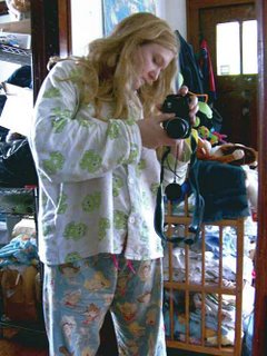 taking a picture of the pajama outfit