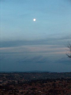 moon in twilight over Kigali