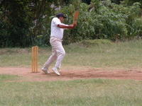 Old Scout Aloka Perera Trying Hard with Bat