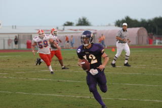 UMHB QB Andy Padrone looks for open field against the Louisianna College Wildcats last year. UMHB will hit the road and head to Louisianna College again this year.
