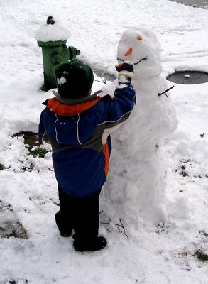 Mini-Critic makes a snowman, February 12, 2006