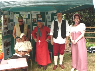 Trust members dressed in a variety of historical costumes