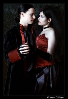 goth couple in red and black clothing