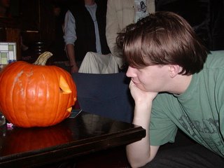 Rob listening intently to Eric the pumpkin