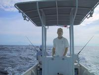 Rob at the helm heading out to blue water fishing