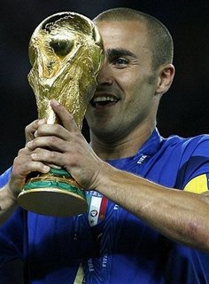 Fabio Cannavaro holds the World Cup trophy