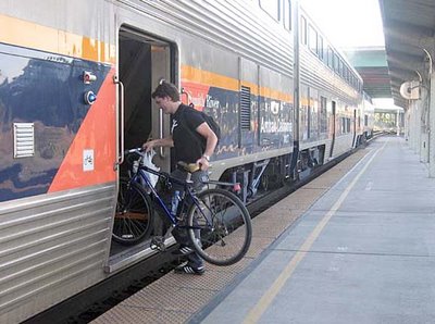 Image of bicyclist loading bike on Capitol Corridor rail car in Sacramento