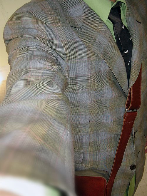 paul smith suit, prada shirt, mark jacobs tie, stephan schneider bag - photo by Joey Briones