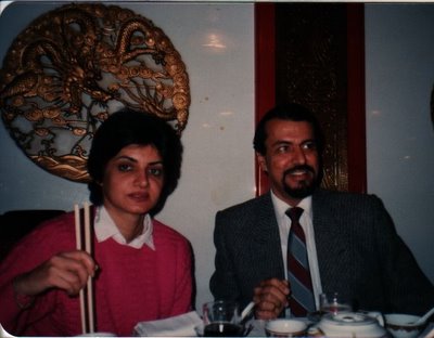Sucheeta and Vijay dining in a restaurant in Hong Kong