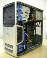 Dell Dimension 5150 with side panel removed.  Note the 12cm front fan and shroud over the CPU cooler.  Note also the rear of the case and cable management