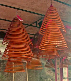 Joss spirals hanging from the ceiling of a Temple