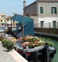 Fruit, veg and flower boat in Murano