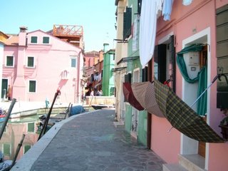 Umbrellas growing from houses on Burano